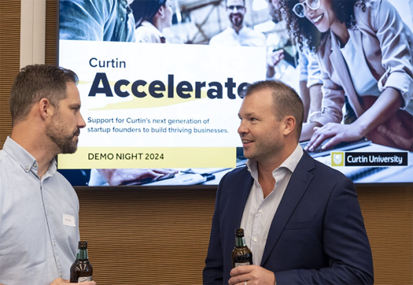 Two men talking at the Curtin Accelerate pitch night